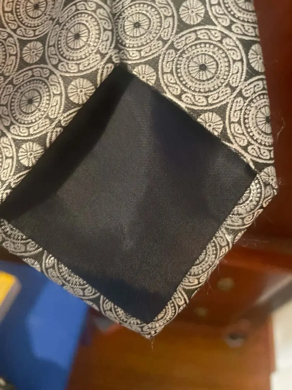 Endless Knot Silver and Black Geometric Medallion Silk Tie